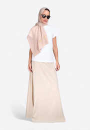 Model wearing EMIRATES LIMITED camel beige scarf by East Vibe